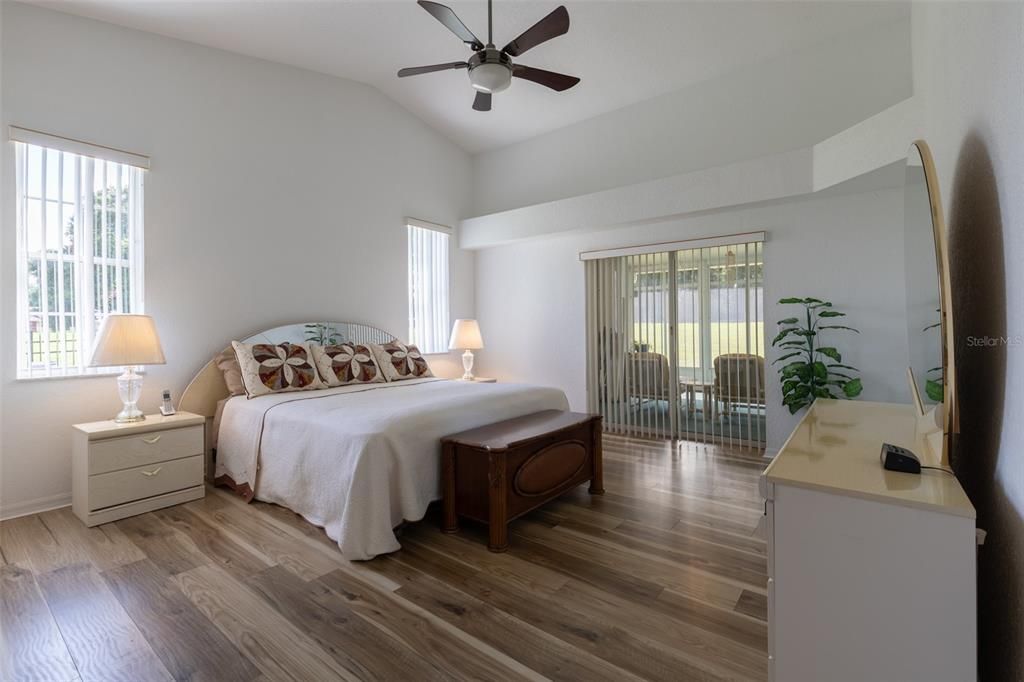 The spacious Primary Bedroom also opens to the Lanai