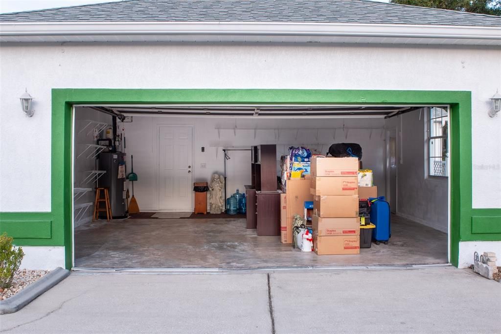 The large 2-car garage has room for