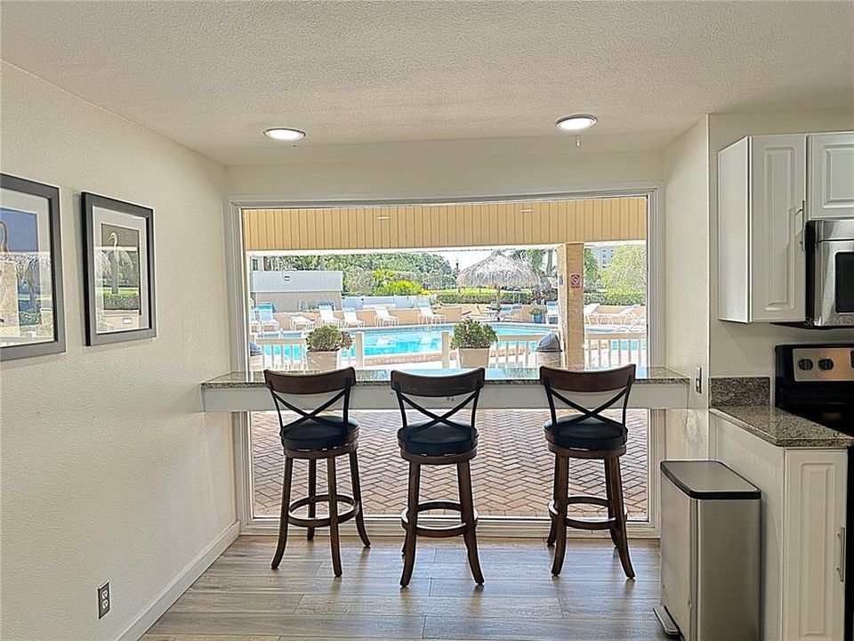 Clubhouse with kitchen overlooking the pool