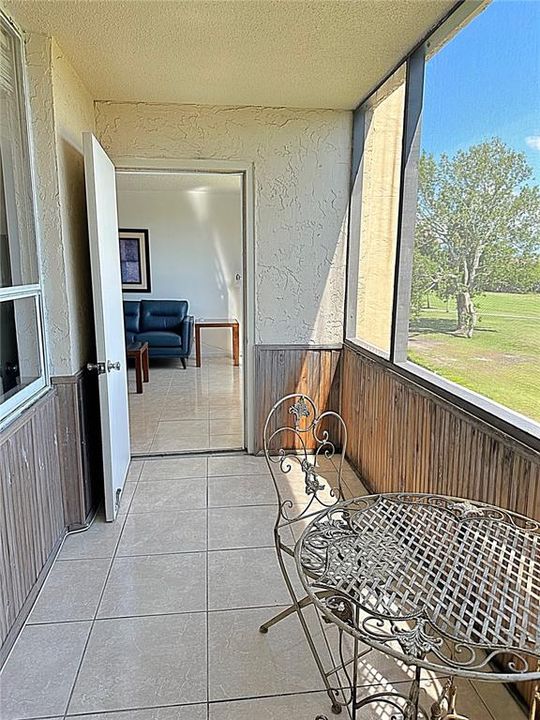 Large screened in porch with views of Tampa Bay