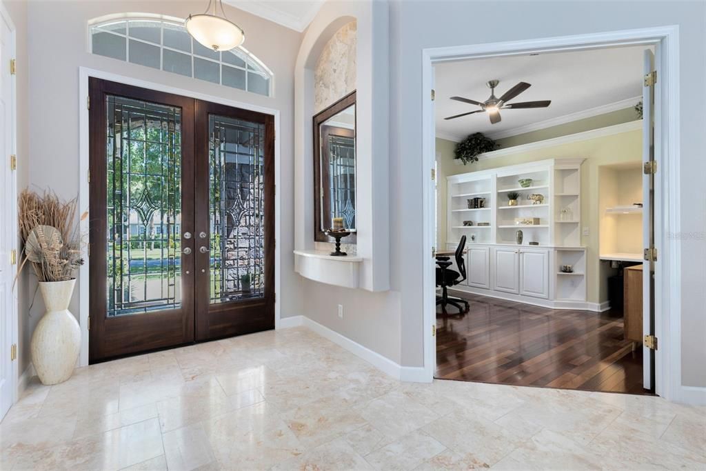 Foyer - double, leaded glass front  doors and office to the left