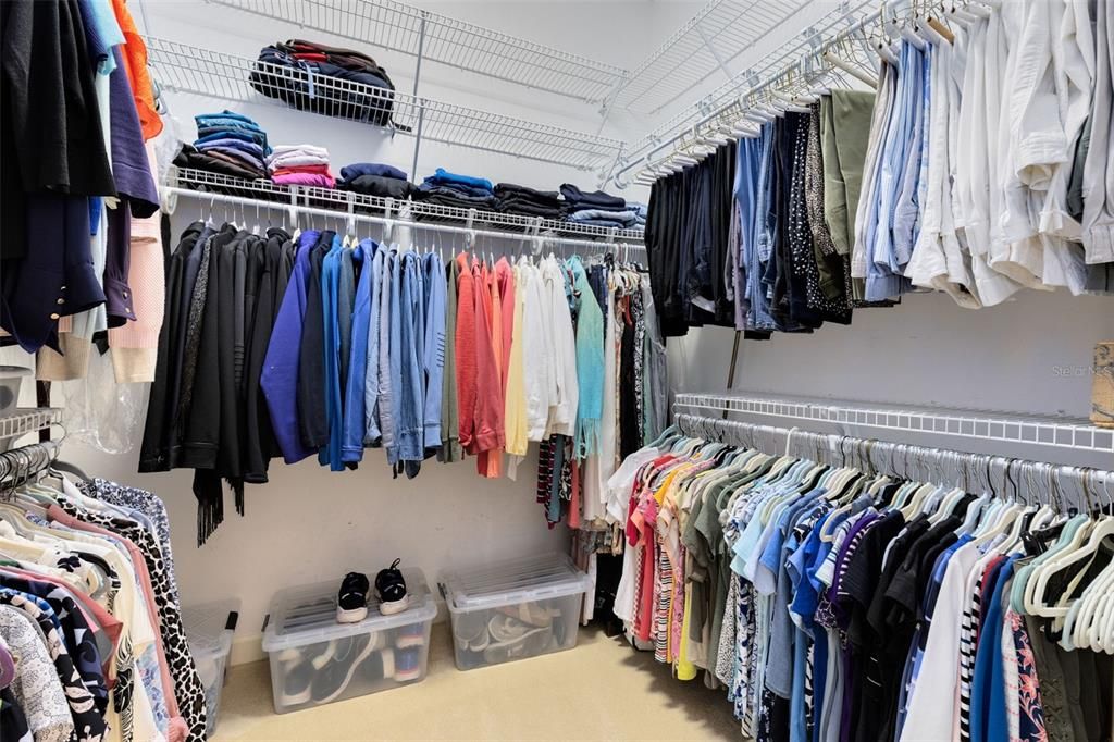 one of the large walk-in primary closets