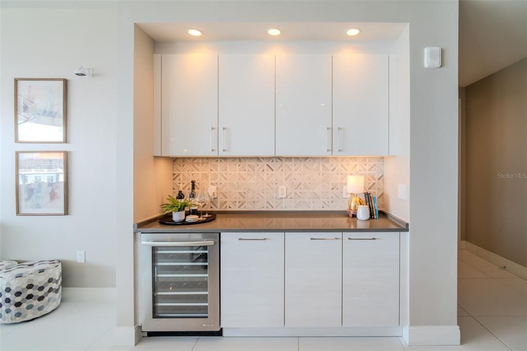 Oversized dry bar with custom back splash