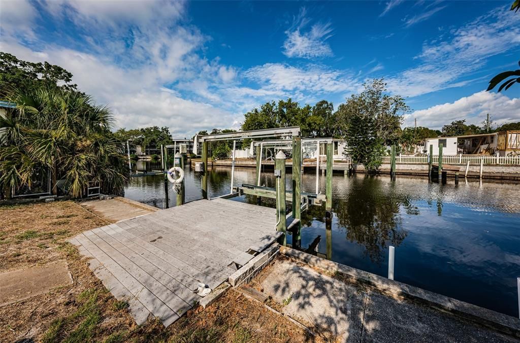 Fish from your seawall. Launch your kayaks and boat from your backyard boat lift!