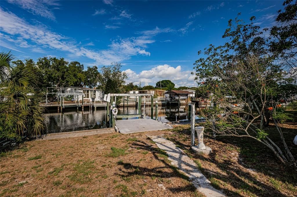 Path leading to your dock and boat lift, right in your backyard! Drop the boat and go!