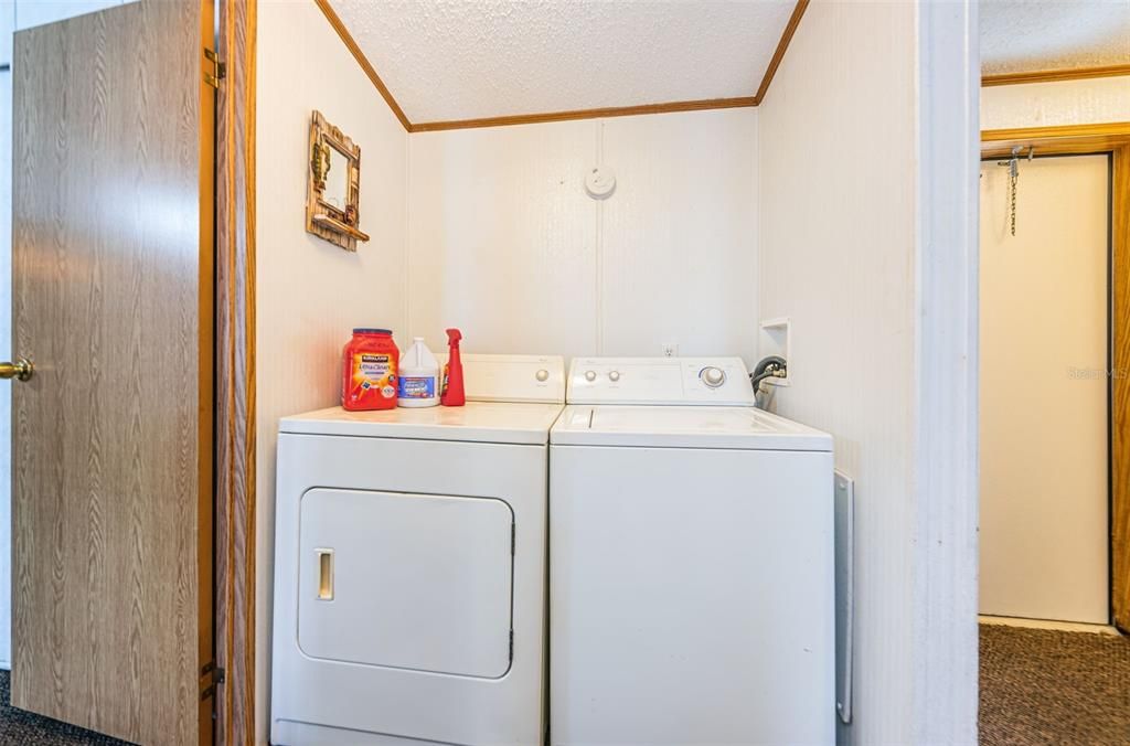 Full-sized Washer & Dryer included and located inside the home.