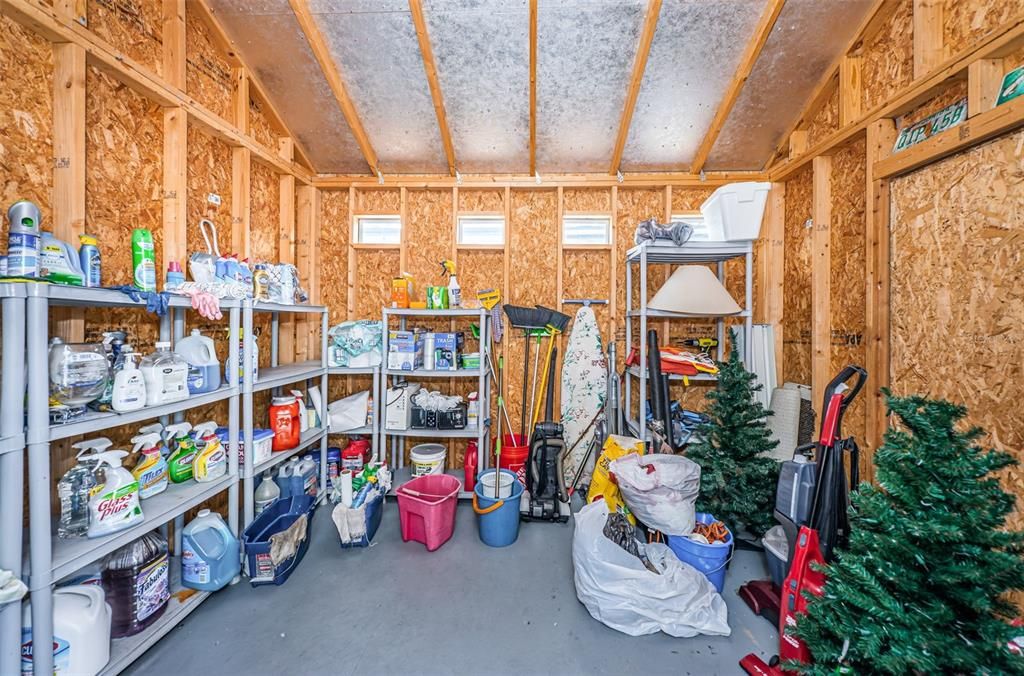 Inside of storage shed. Current owner operates this property as a successful Short-term rental & stores the cleaning supplies & equipment here, used between guests.