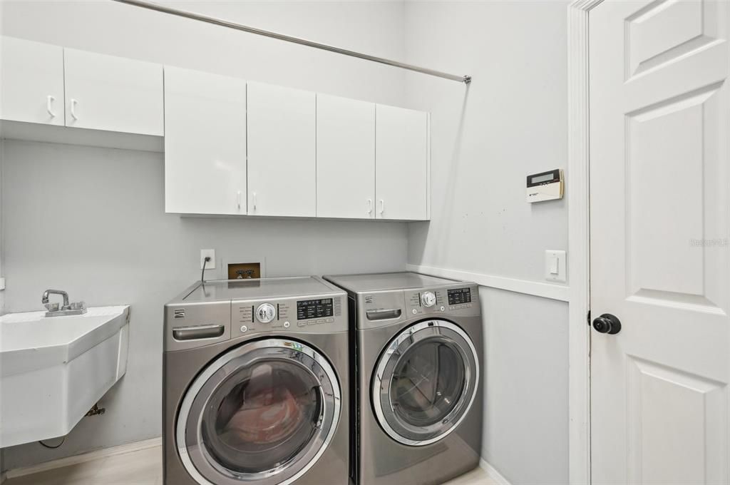 Inside Laundry Room adjacent Kitchen & Garage