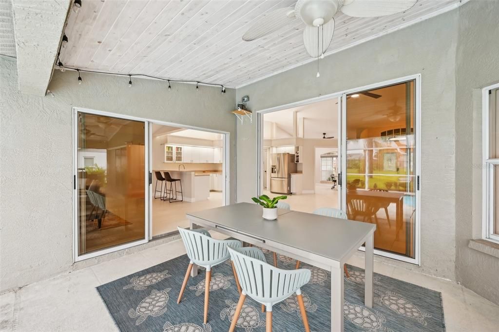 Large Lanai with shiplap ceiling detail