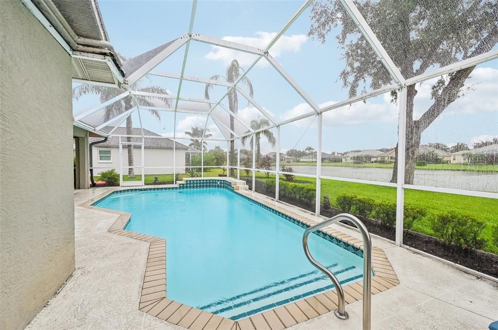 Enjoy the large heated pool and nature by the pond!