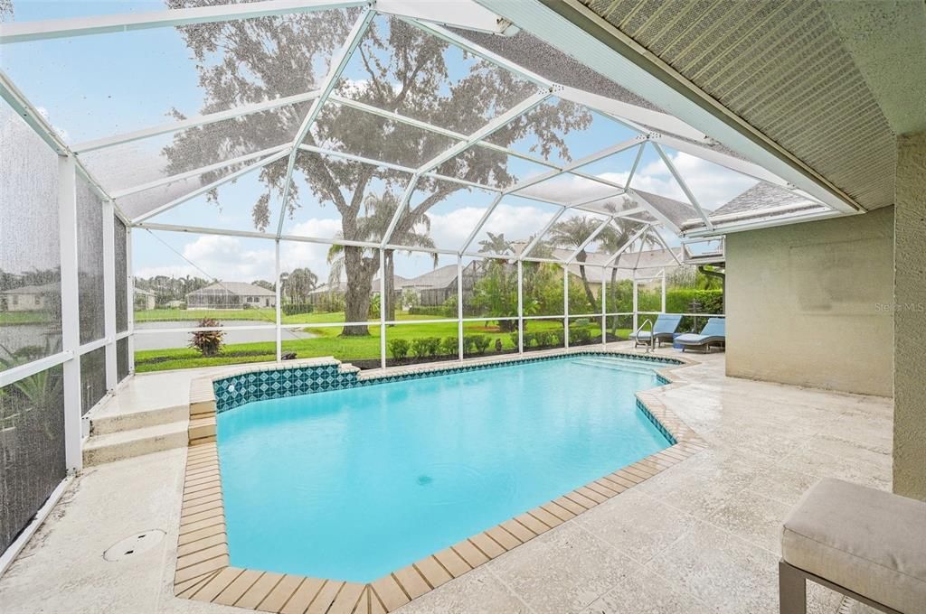 Enjoy the large heated pool and nature by the pond!