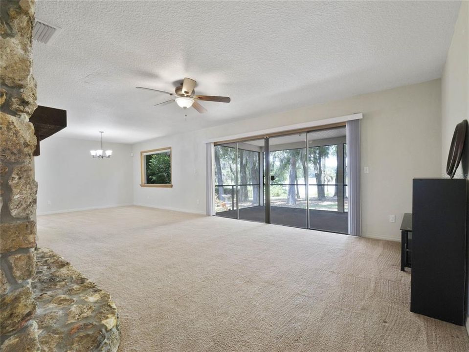 Family Room overlooking screened lanai and backyard