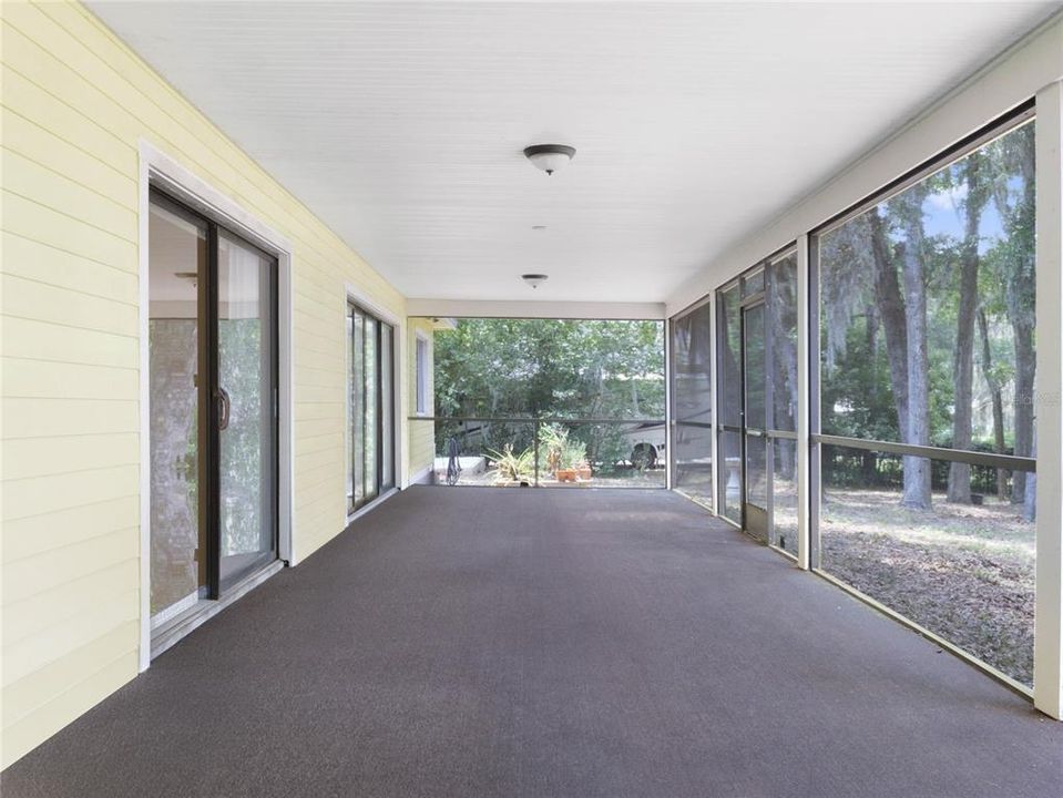 Massive 52x12 Screened Lanai overlooking backyard