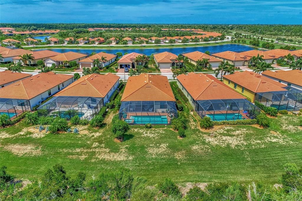 Aerial of the home and back pool