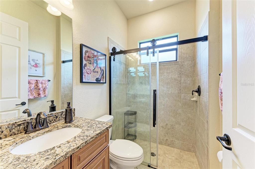 Guest bathroom nestled between guest bedroom 2 & 3