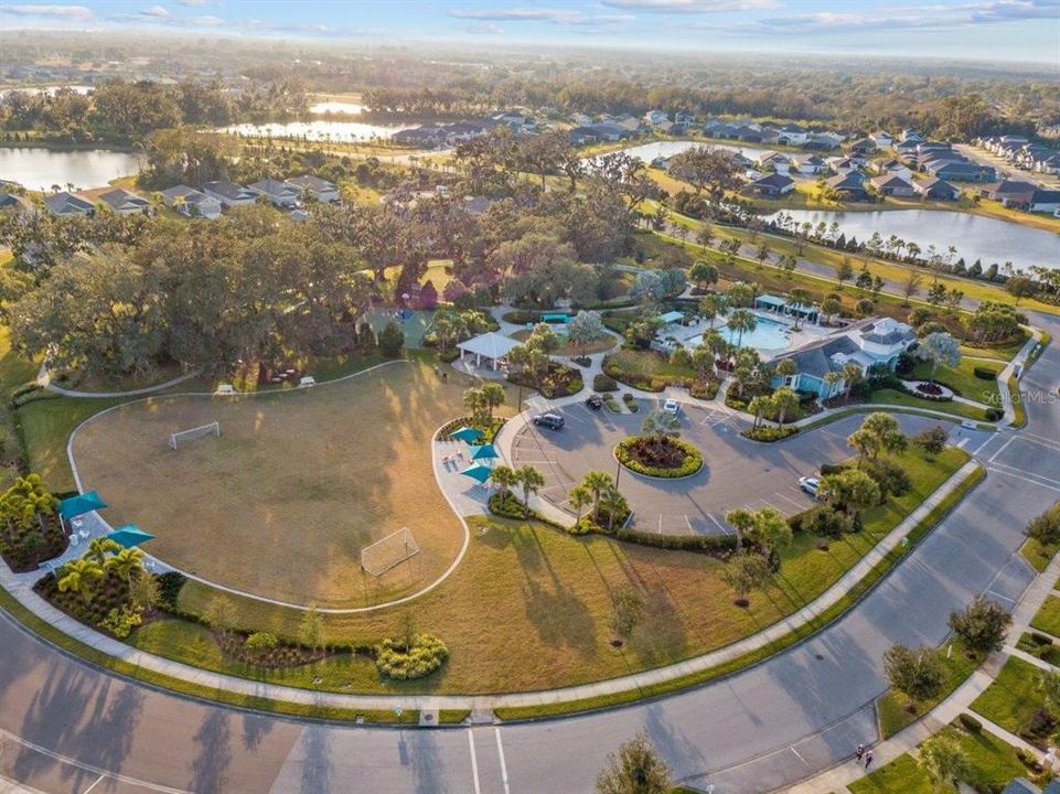 Silverleaf Amenities Center featuring a multipurpose field, dog park, club house, and community pool.