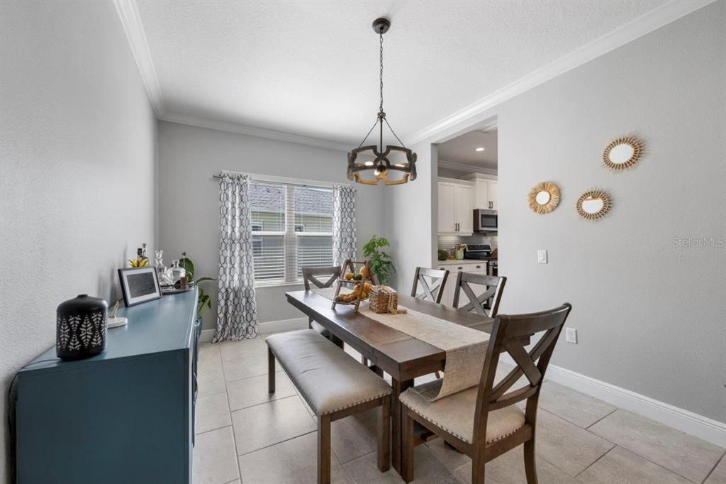 Large Dining room with direct access to the kitchen.