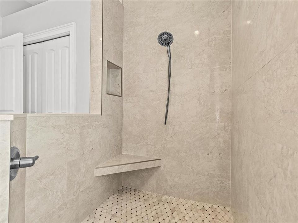 Updated Primary Bath with Dual Granite Vanity, Walk In Shower and Private Water Closet
