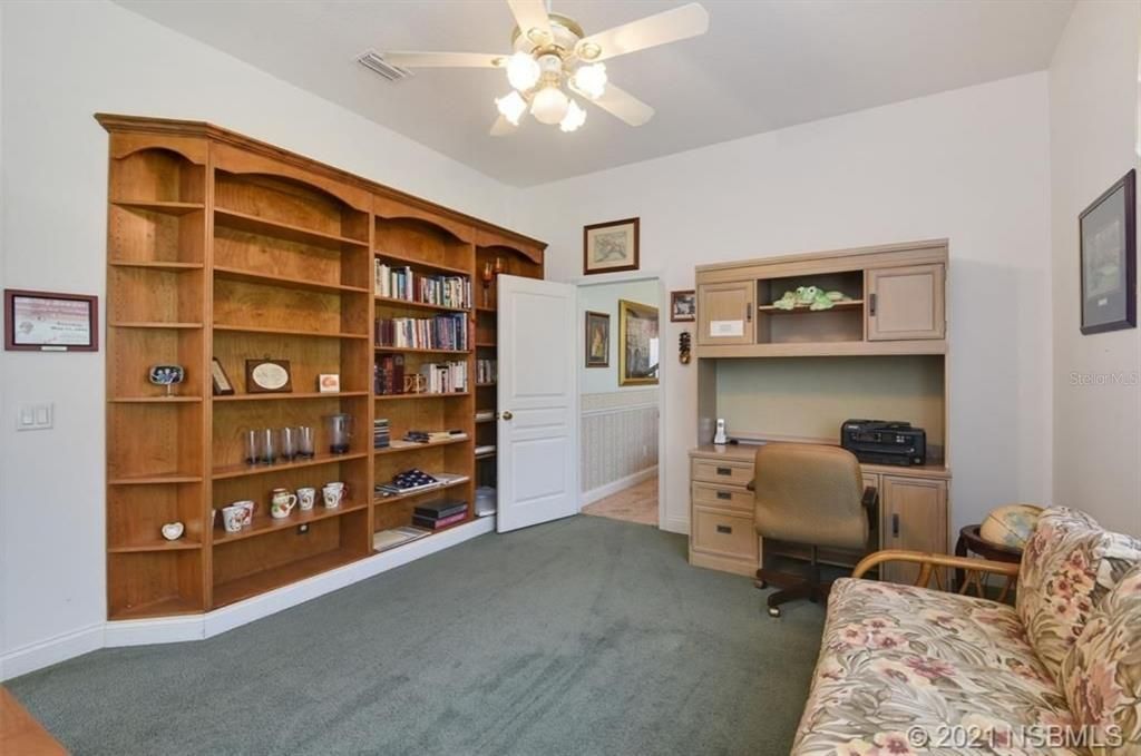 MAIN HOUSE - IN-LAW SUITE OR LIBRARY OR BEDROOM W BATH & SEPARATE ENTRANCE TO GARAGE.