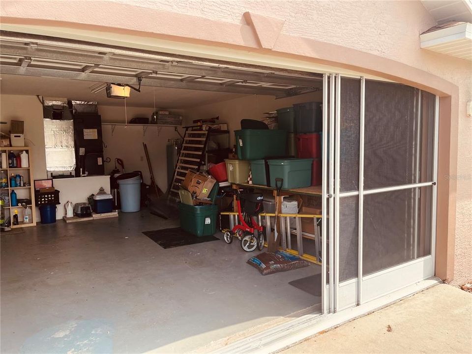 Garage with extra screen sliding door