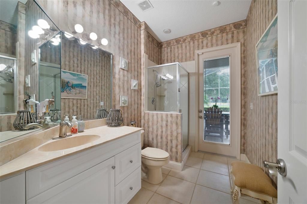 FULL GUEST BATHROOM WITH POOL ACCESS