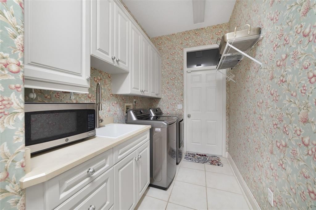 LAUNDRY ROOM WITH ACCESS TO GARAGE