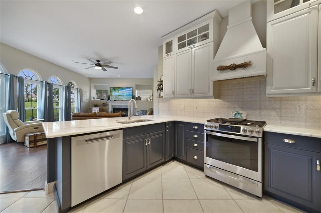 UPDATED KITCHEN WITH CUSTOM RANGE HOOD