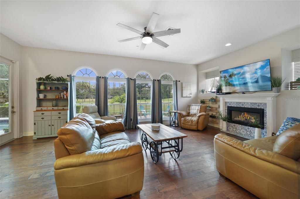 OPEN FAMILY ROOM WITH LOTS OF NATURAL LIGHT