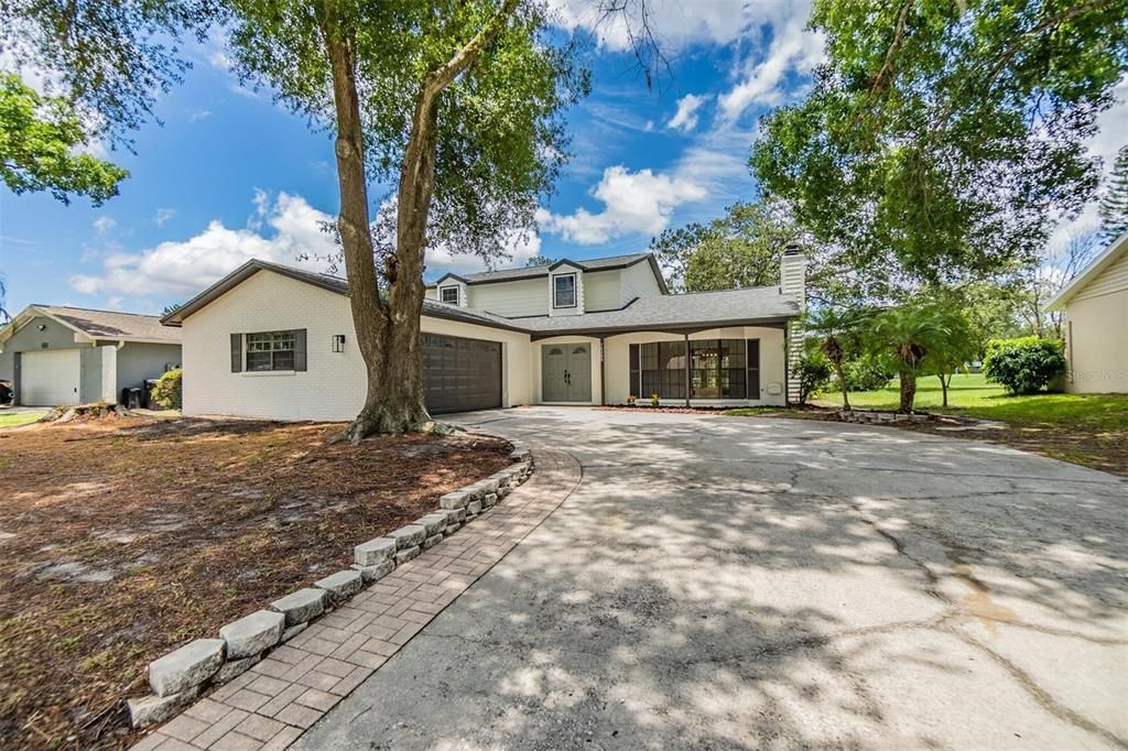 Long driveway leads to two car garage - room for plenty of parking