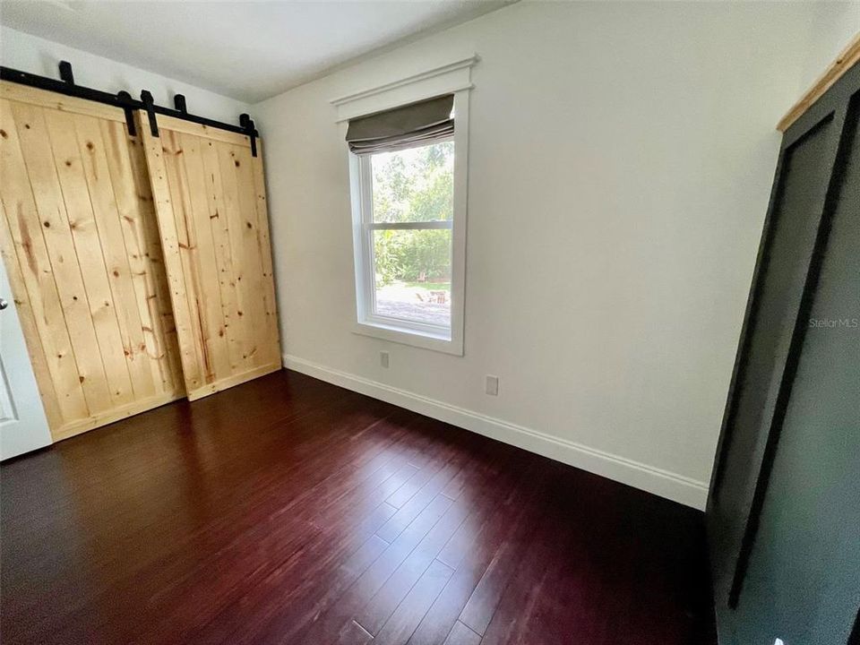 Second bedroom looking toward closet