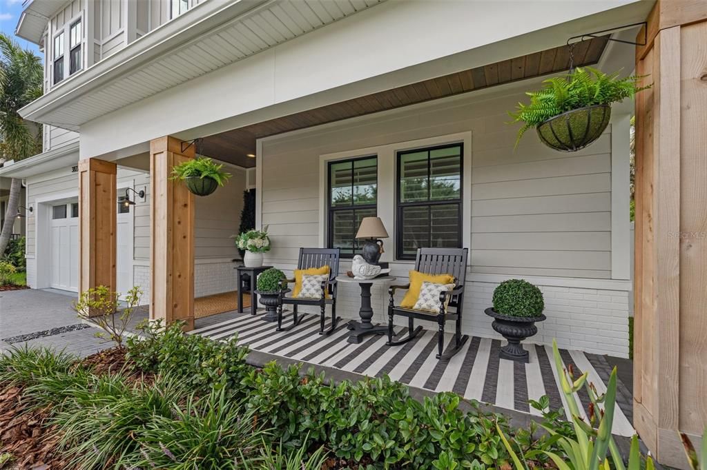 Inviting Front Porch with custom wood wrapped columns!