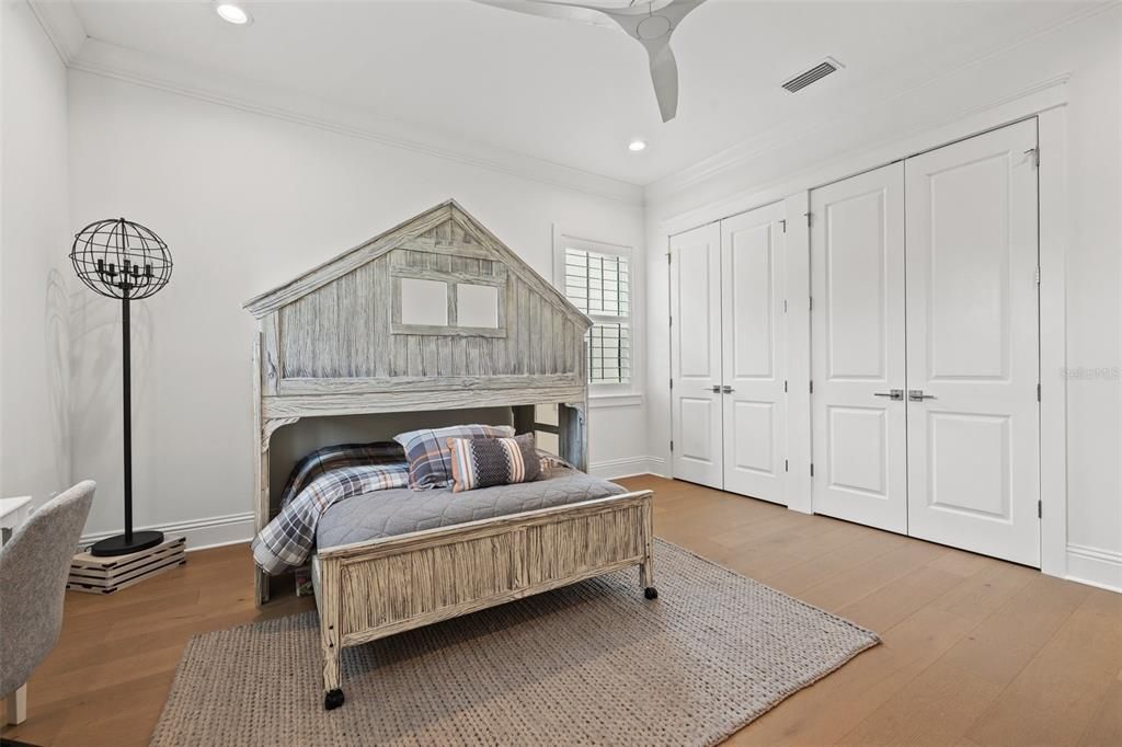 Upstairs bedroom with custom walk-in closet