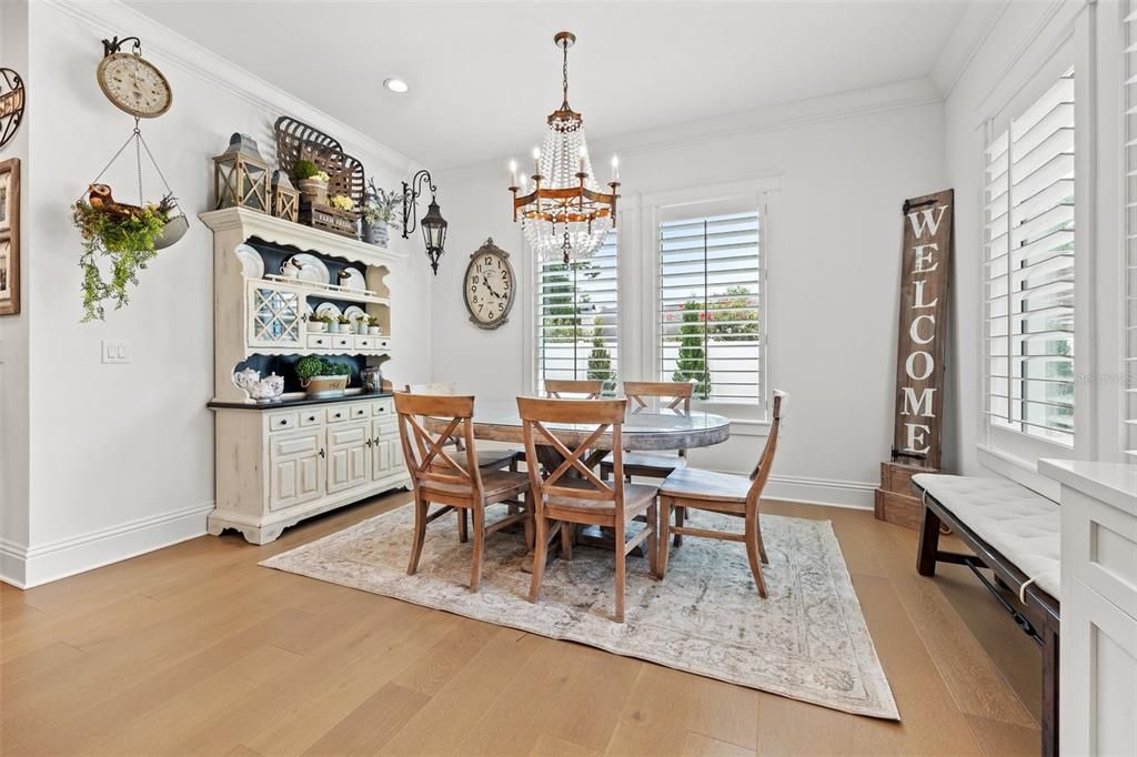 Spacious eat-in space in kitchen with gorgeous chandelier!