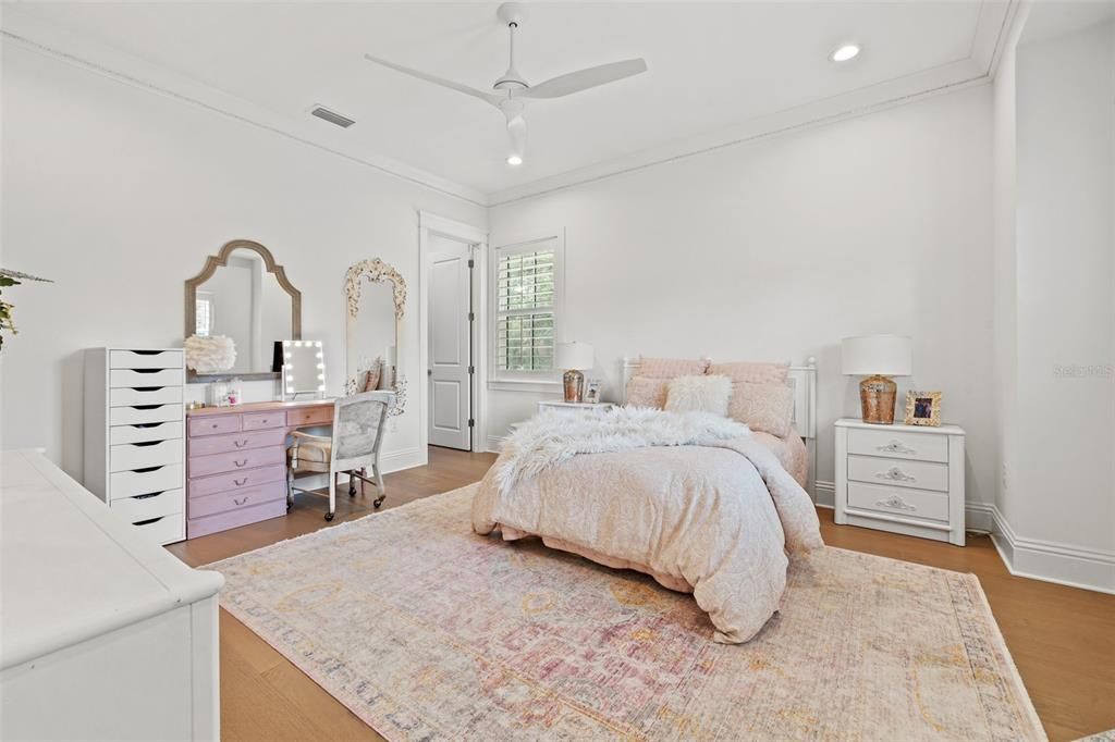 Upstairs bedroom with ensuite bath and oversized custom walk in closet