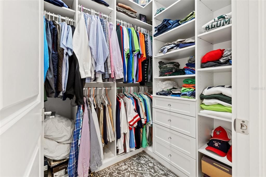 One of two, generous custom walk -in closets