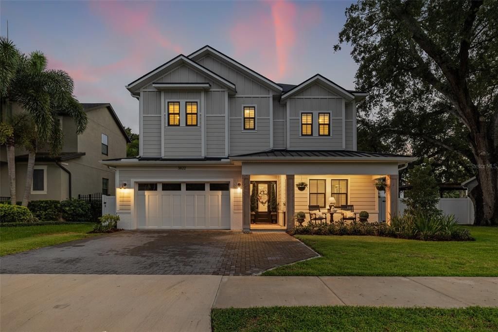 Exterior Home at night with gorgeous lighting.