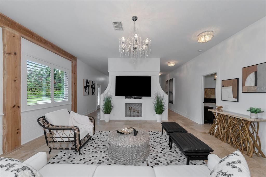 Living room with decorative fire place