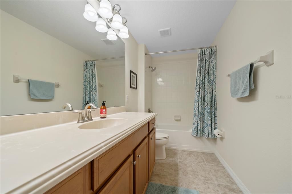 Secondary bathroom upstairs with tub/shower