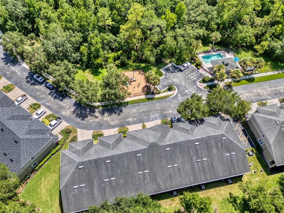 Community pool is conveniently located right across the street