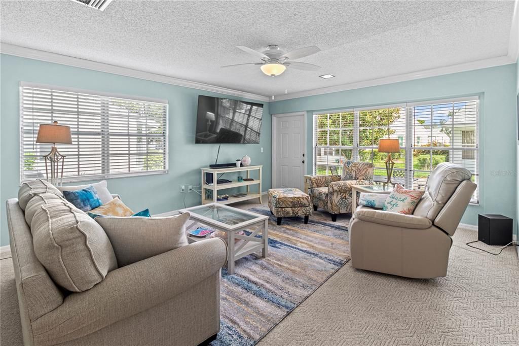 Light and bright living area with oversized picture window