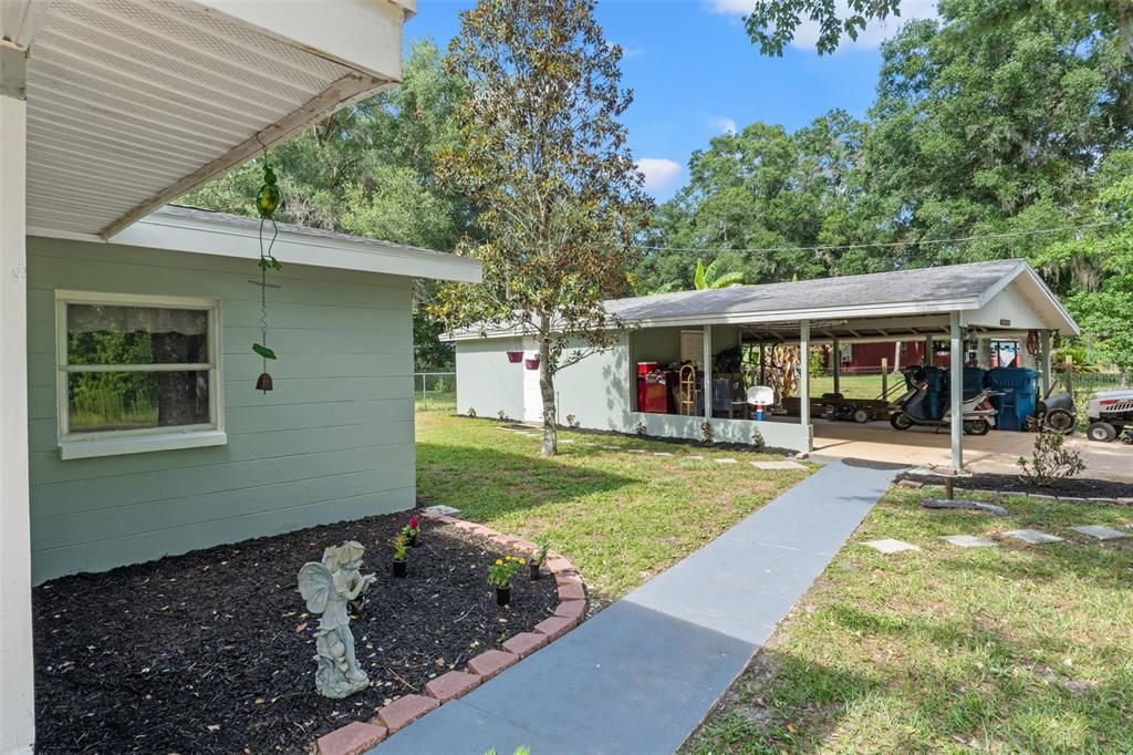 Side yard and carport garage apartment