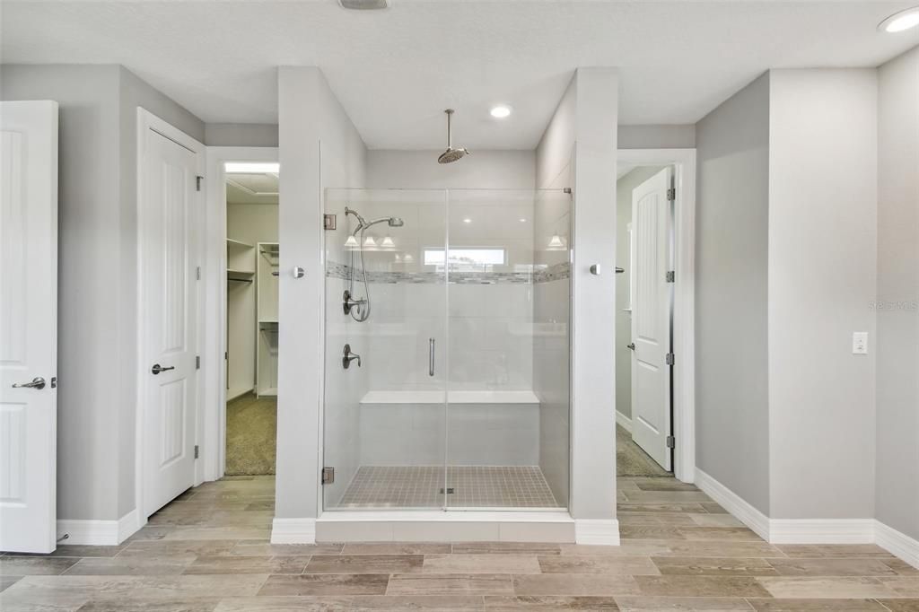 Primary Bath Shower & Two Walk-In Closets