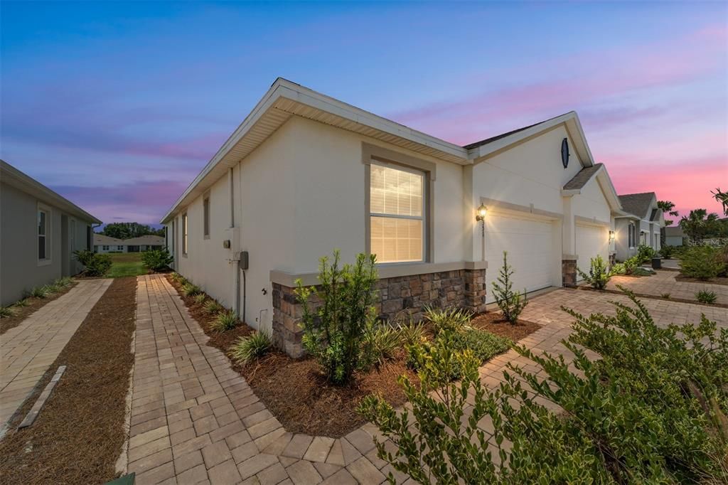 Paver walk way and driveway with stone accent