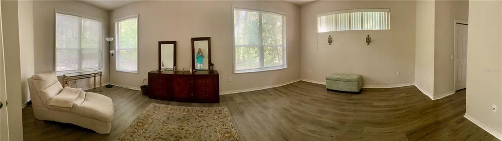 Primary Bedroom With Large Windows for Natural Light