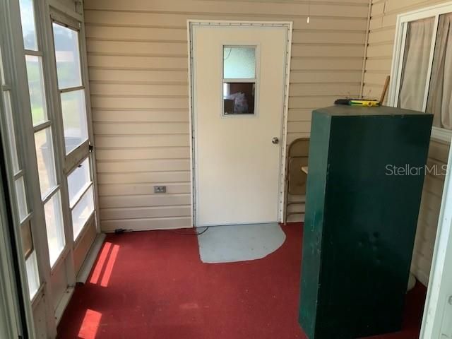 Vinyl enclosed porch & extra storage room