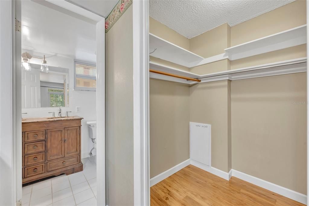 Closet looking into the bathroom