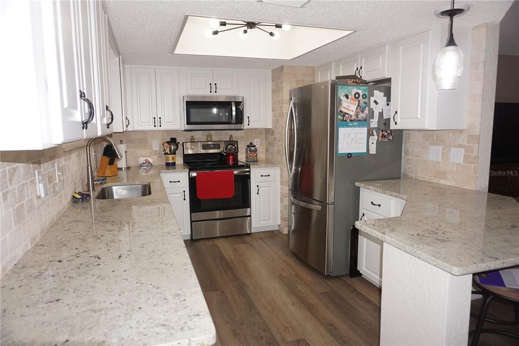 View of kitchen from dining area