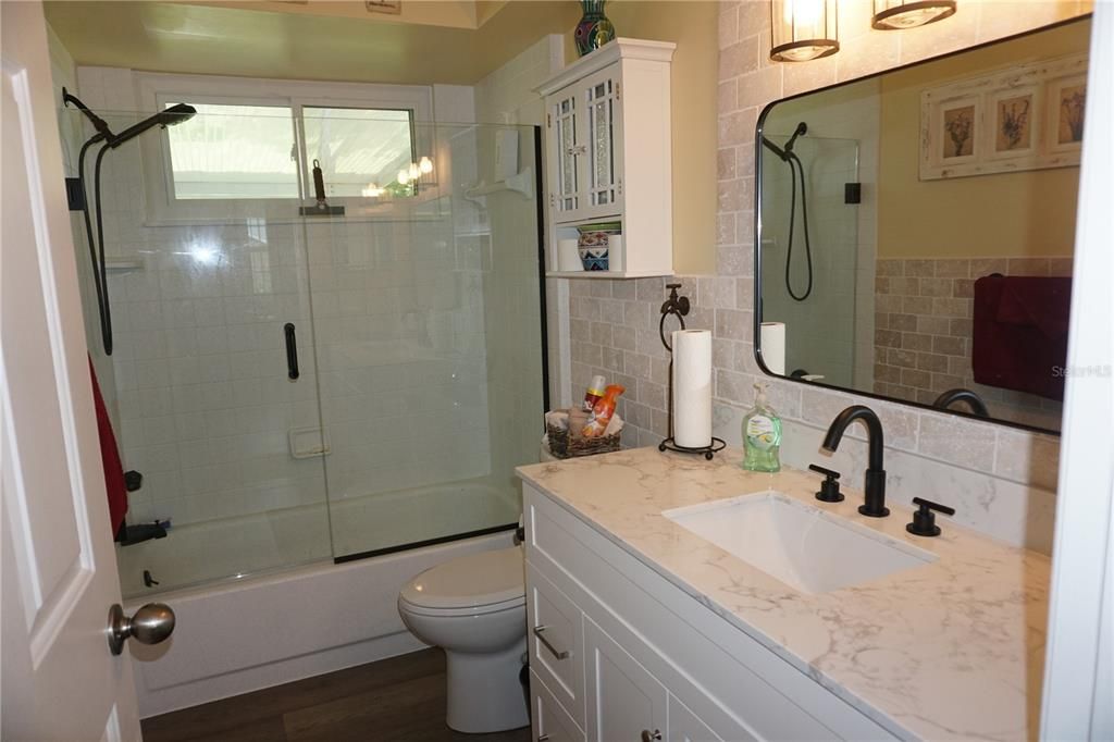 NEWLY REMODELED GUEST BATH WITH TUB AND SHOWER