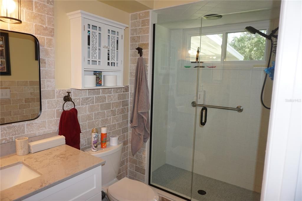 MODERN TILE WORK AND NEW COMMODE