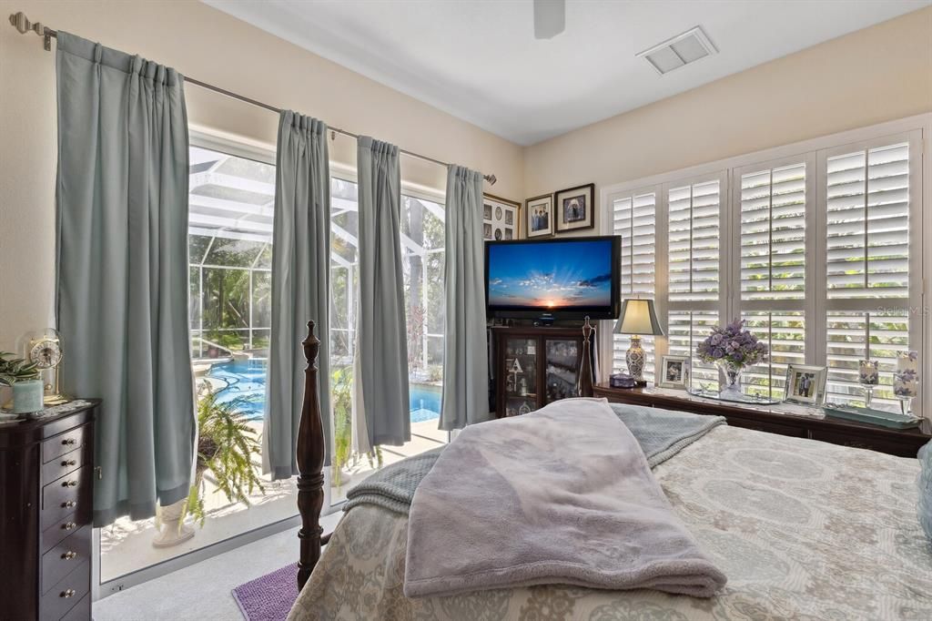 Bedroom 3 with sliding door access to pool